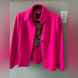 Pink blazer that I love but it is too small on me